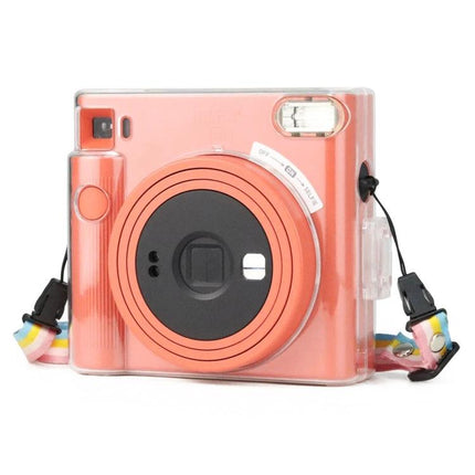Clear Crystal Camera Bag for Fujifilm Instax Square SQ1 with Shoulder Strap - transparent protective cover showing pink Instax camera and rainbow strap