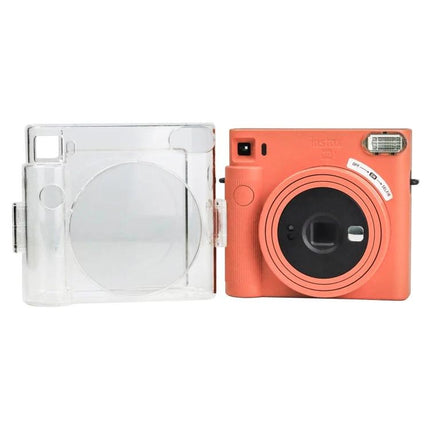 Clear Crystal Camera Bag for Fujifilm Instax Square SQ1 with Shoulder Strap shown open next to coral Instax Square SQ1 instant camera
