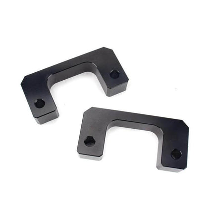 Front Leveling Lift Kit 2 Inch For Chevrolet Silverado - black anodized aluminum front spacers showing two U-shaped leveling blocks