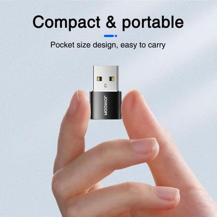 JOYROOM USB-C Adapter for Daily Device Connections at Home - compact portable USB-C adapter held between fingers for easy daily file transfer and charging