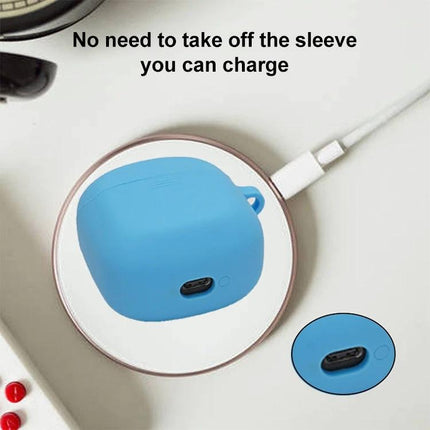 JBL Silicone Protective Case for Everyday Earphone Carry - blue silicone sleeve shown charging wirelessly on desk, protects JBL Club Pro + TWS
