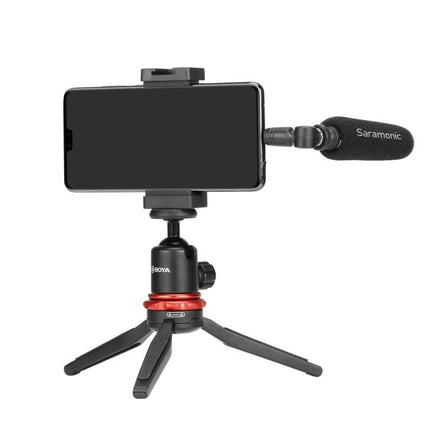Saramonic Microphone for Everyday Mobile Recording Needs mounted on smartphone with mini tripod and windscreen for clear mobile audio