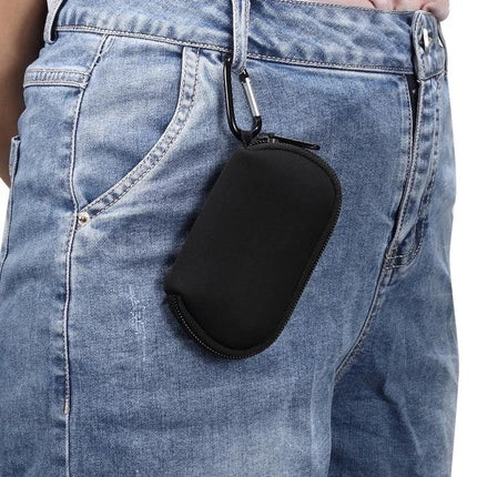 Keep Your Earphones Protected in a Compact Daily Bag hanging from jeans pocket with zipper and carabiner