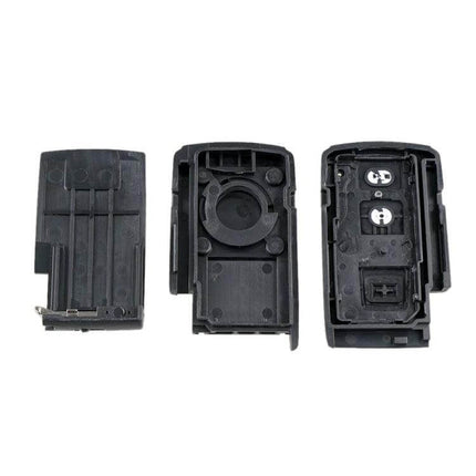 2-Button Replacement Key Shell for Toyota Prius and Similar Models showing three black key shell halves ready for electronics transfer