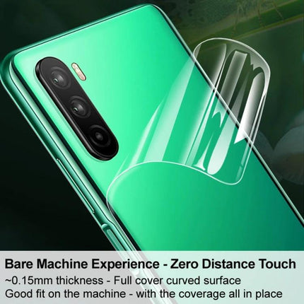Alt Tag: IMAK Hydrogel Full Coverage Back Protector For Smartphones on curved green phone showing clear hydrogel sheet applied
