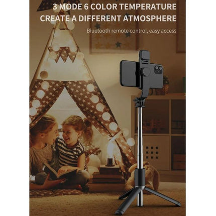 Versatile Tripod for Capturing Everyday Phone Moments shown as a compact selfie stick tripod holding a phone for steady family photos