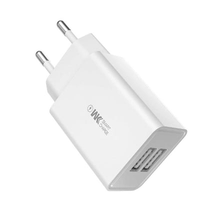 Versatile Travel Charger for Everyday Device Powering Needs - compact dual USB white wall adapter for smartphone and tablet charging