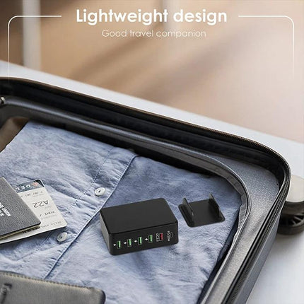 Versatile Multi-Port Charger for Travel Device Needs shown compact in suitcase with six-port USB charging multiple devices