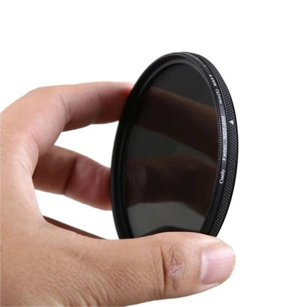 Cuely Adjustable Neutral Density Filter for Photo Shooting held between fingers, showing slim ND2–ND400 variable filter