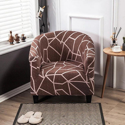 Elastic All Inclusive Semicircle Printed Grey Sofa Cover on patterned armchair in modern living room, elastic U-shaped fit protecting upholstery