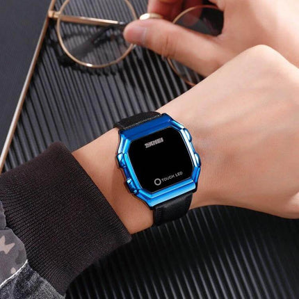 SKMEI LED Digital Watch with Leather Strap and Luminous Button on wrist showing blue case, black leather strap and LED display for jogging and casual use