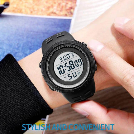 SKMEI LED Digital Watch with Date and Alarm Functions - black sports LED watch showing time, date, stopwatch and alarm on wrist