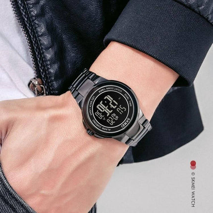 SKMEI Dual Time Digital Watch with Stainless Steel Strap on wrist showing digital dual time display and stopwatch for travel and sports