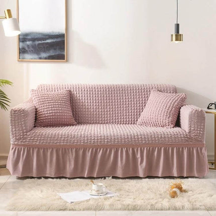 Stretch Sofa Cover With Skirt for Double M 145-185cm Sofas in pink seersucker fabric with lotus-leaf skirt, straps, and cushions protecting sofa