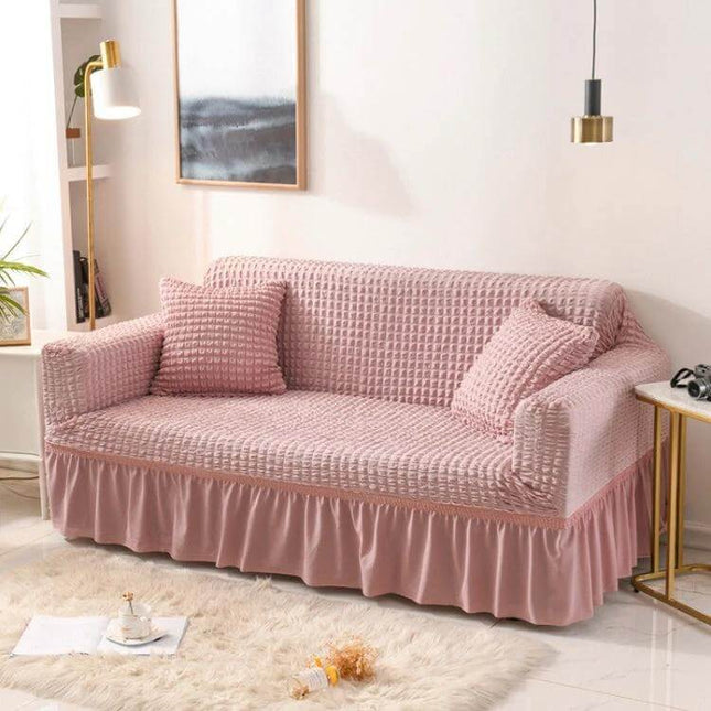 Stretch Sofa Cover With Skirt for Double M 145-185cm Sofas in pink seersucker fabric with lotus-leaf skirt protecting sofa from spills and pet hair