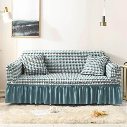 Stretch Sofa Cover With Skirt for Double M 145-185cm Sofas in teal seersucker fabric with lotus-leaf skirt, straps, and matching cushions protecting sofa