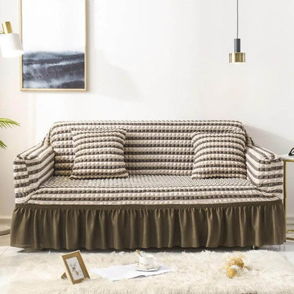 Stretch Sofa Cover With Skirt for Double M 145-185cm Sofas in striped seersucker fabric with lotus-leaf bottom skirt and secure straps protecting sofa