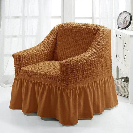 Four Seasons Universal Elastic Skirt Style Sofa Cover 90-140cm on a rust-colored armchair protecting against pet and kid wear
