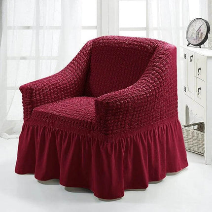 Four Seasons Universal Elastic Skirt Style Sofa Cover 90-140cm shown on a red upholstered armchair protecting from pet and kid wear