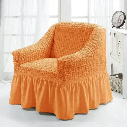 Four Seasons Universal Elastic Skirt Style Sofa Cover 90-140cm on an orange armchair protecting against pets and kids, polyester elastic fitted skirt design