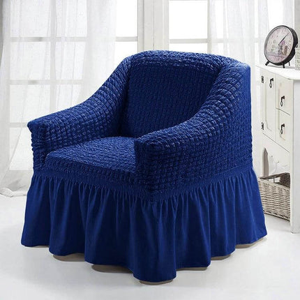 Four Seasons Universal Elastic Skirt Style Sofa Cover 90-140cm on navy blue armchair protecting from dirt, pet hair and wear