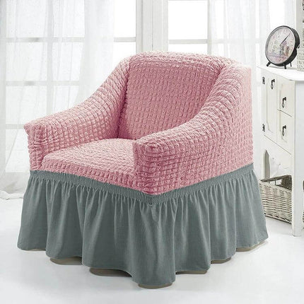 Four Seasons Universal Elastic Skirt Style Sofa Cover 90-140cm pink quilted top with grey skirt on armchair protecting from pets and kids