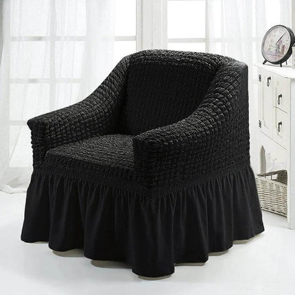 Four Seasons Universal Elastic Skirt Style Sofa Cover 90-140cm on black armchair protecting fabric and adding skirted finish
