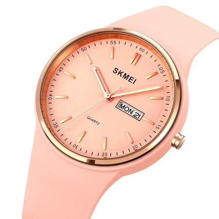 SKMEI Ladies Quartz Watch with Silicone Strap and Daily Functions - pink silicone strap day/date dial, lightweight everyday women's watch