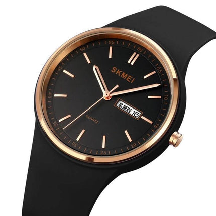 SKMEI Ladies Quartz Watch with Silicone Strap and Daily Functions - black dial, rose gold bezel, silicone strap, date window, lightweight everyday women's watch