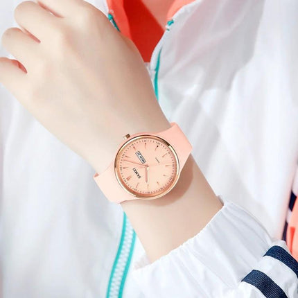 SKMEI Ladies Quartz Watch with Silicone Strap and Daily Functions shown on wrist in pink silicone, lightweight everyday women's watch, 30m water resistant
