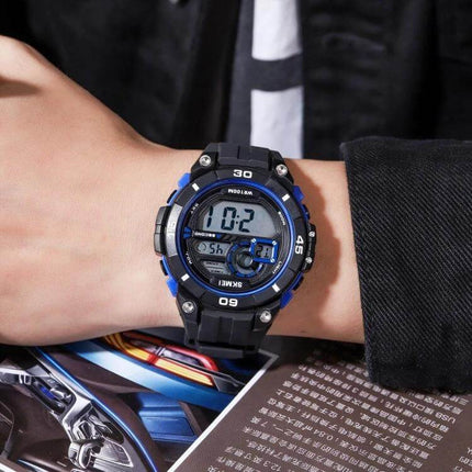 SKMEI Men's Luminous Dual Time Alarm Waterproof Sports Watch on wrist, black blue digital sports watch showcasing dual time and stopwatch