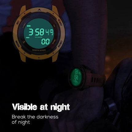 North Edge Mars Men's Waterproof Luminous Sports Watch displaying luminous green digital time on wrist in low-light outdoor setting