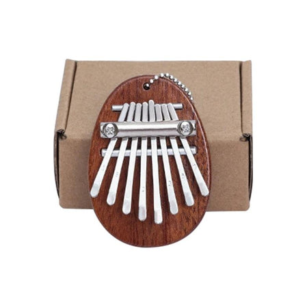 Thumb Piano Kalimba for Relaxing Moments in Daily Life - compact wooden 8-key thumb piano on gift box