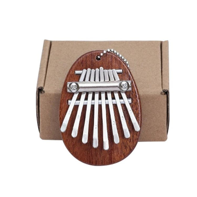 Thumb Piano Kalimba for Relaxing Moments in Daily Life - compact wooden 8-key thumb piano on gift box