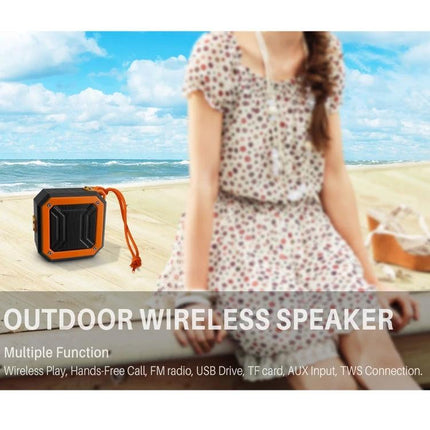 Rixing Compact Bluetooth Speaker For Portable Everyday Use shown pocketable orange outdoor speaker on beach with woman