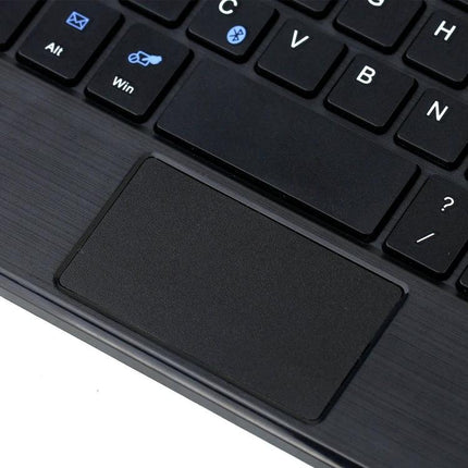 Detachable Bluetooth Keyboard Leather Case for iPad mini 6 with Touchpad showing close-up of black touchpad and keyboard keys