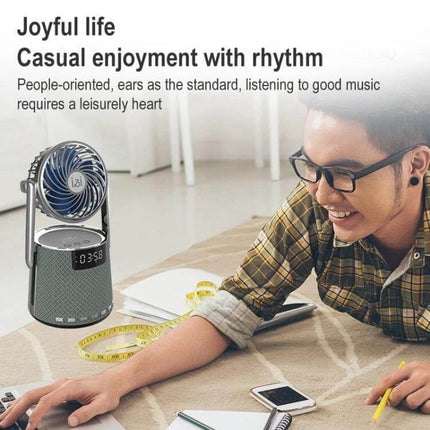 SOAIY Bluetooth Alarm Clock With Dual Alarms And Bedside Fan on nightstand with fan speaker showing time and temperature, bedside use