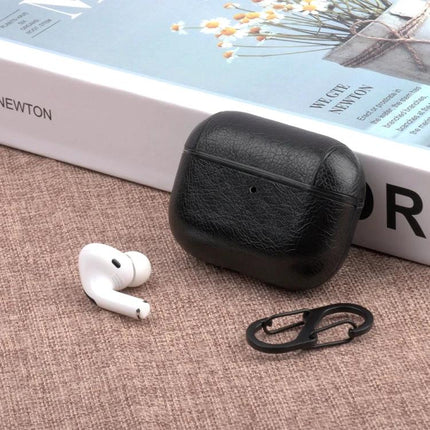 Leather Case for AirPods Pro with Hook for Daily Carry - black leather protective case with carabiner on table, AirPods Pro beside it