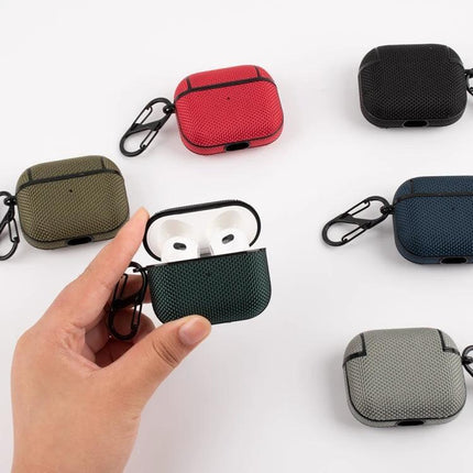 Waterproof Nylon Case for AirPods 3 with Hook for Daily Use — green nylon protective case clipped to a hand, surrounded by red, black, blue, gray cases