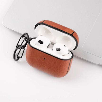 Protective Leather Case for Everyday Earphone Protection - brown leather earphone case with keyring holding white earbuds
