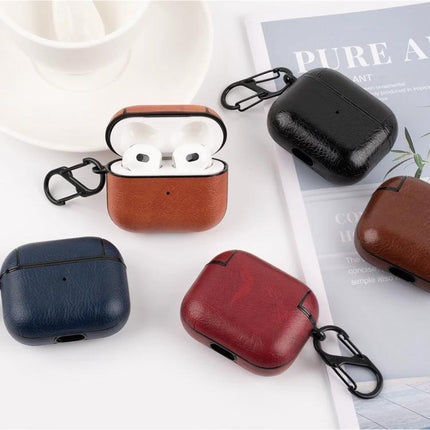 Protective Leather Case for Everyday Earphone Protection in brown, black, red and blue with keyring showing pocket-ready design