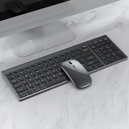 Versatile Three-Mode Wireless Bluetooth Keyboard and Mouse Set for Daily Use - slim grey keyboard and mouse on marble desk