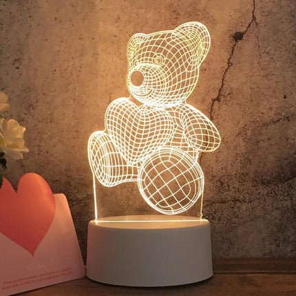 Decorative 3D LED Night Light for Home and Bedroom Settings showing a glowing 3D wireframe teddy bear on a white base