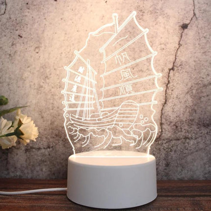 Enhance Your Home Decor With A Fun LED Night Light showing a white sailboat-shaped LED night light on a round base, perfect for bedroom ambient lighting