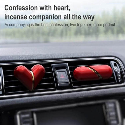 Deformable Car Air Outlet Fragrance Ornament Heart Shaped Aromatherapy attached to car vent releasing subtle scent and decorative pearl-coated heart design