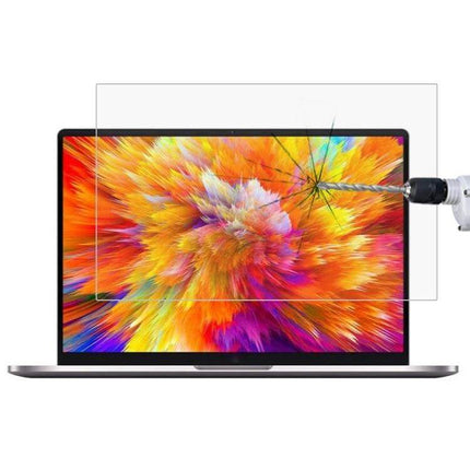 HD Tempered Glass Screen Protector for 15.6-Inch Laptops showing reinforced shatter-resistant layer blocking drill impact while preserving vivid display colors
