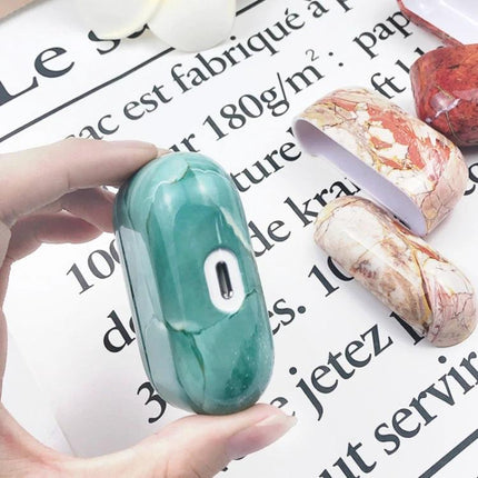 Marble Protective Case for Daily AirPods Pro Use showing green marble charging-port-access case held in hand
