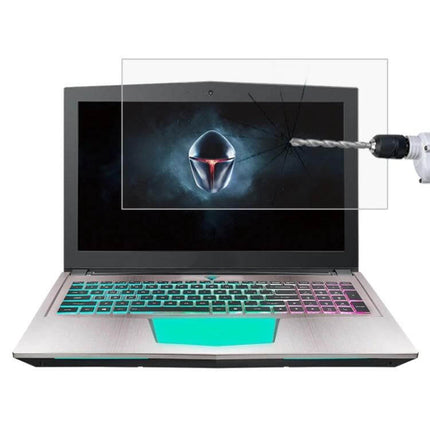 HD Tempered Glass Screen Protector for 15.6 Inch Laptops shown protecting laptop display from drill impact, anti-scratch anti-smudge clear coverage