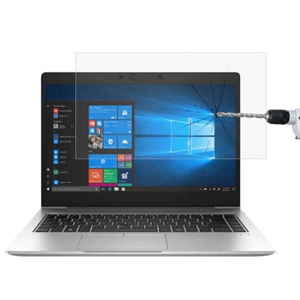 HD Tempered Glass Screen Protector for 14-Inch HP Laptops shown on silver laptop with drill hitting protector to demonstrate shatter resistance