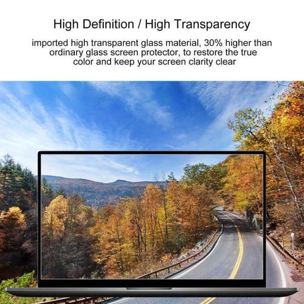 Clear Tempered Glass Screen Protector for 14-Inch Laptops showing high transparency on laptop display with clear highway and fall foliage scenery